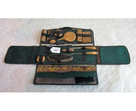 A green aniline Moroccan cased grooming set with fire guild appointments, to include: nail buffer, aide-mémoire, Meerschaum m