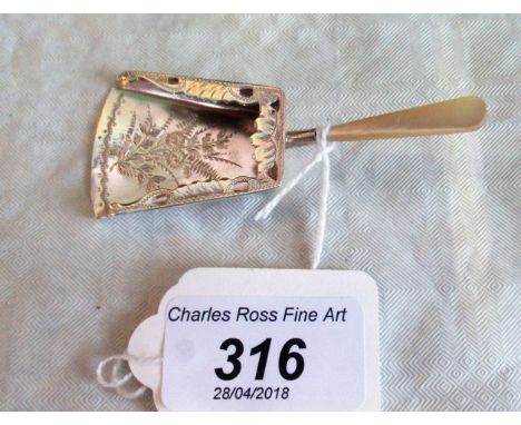 A late Victorian silver and mother of pearl handled caddy spoon of engraved tapering form, maker unclear, Birmingham 1896.   