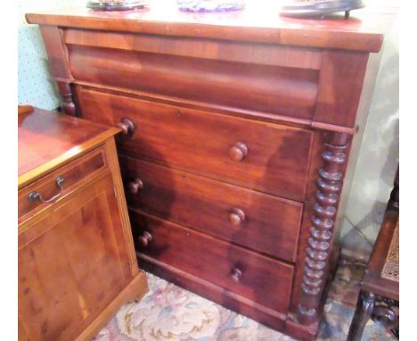 A Victorian mahogany chest, the rectangular top over cushion moulded frieze drawer, three further long drawers each with turn
