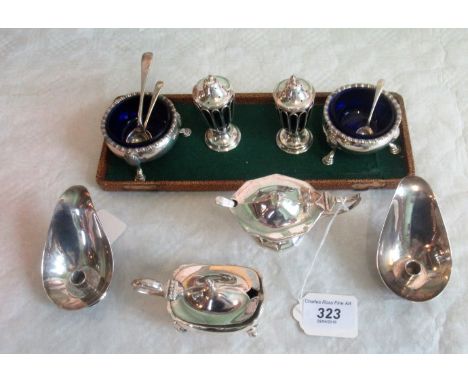 A collection of miscellaneous silver items to include: a pair of George II cauldron form silver salt cellars and correspondin