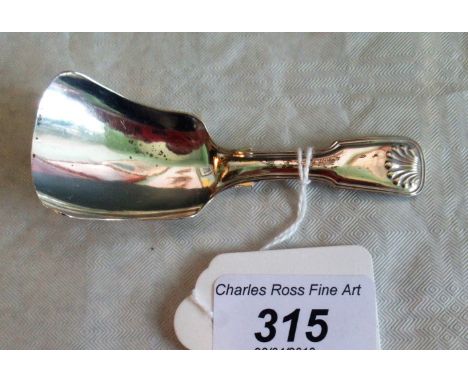 A William IV silver fiddle and shell pattern caddy spoon of simple pressed form, Birmingham 1835 by George Unite. Condition R