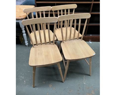 A set of four Loaf light oak lathe back kitchen chairs 