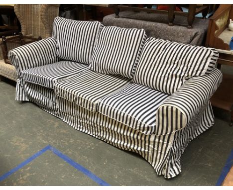 A black and white striped three seater sofa, 215cmW 