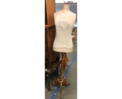 A vintage shop mannequin on a turned wooden base, 164cm 