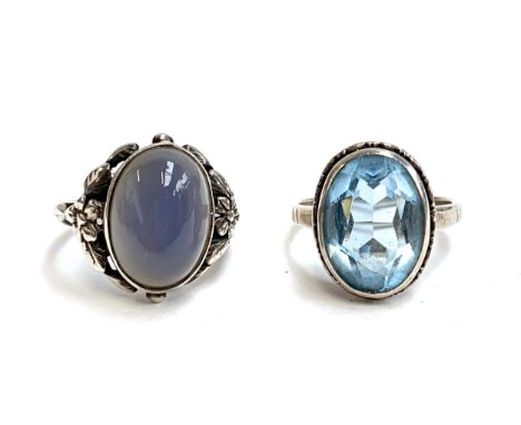 A silver and chalcedony Arts and Crafts Bernard Instone style ring, size M 1/2, 4g; together with a silver Art Deco blue topa