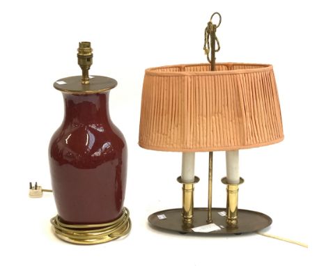 A red glaze table lamp (af), 42cmH overall; together with a further two fitting table lamp 