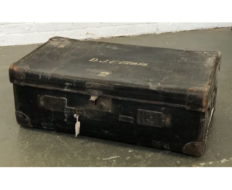 A Victorian black canvas and leather bound travel trunk, the top inscribed 'D.J.C Glass', 93cmW; together with a further canv
