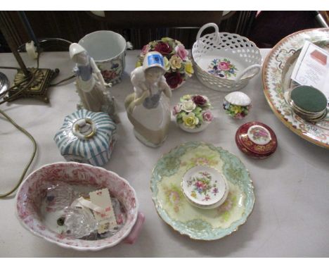 A mixed lot of ceramics to include Nao figures, Royal Doulton flower displays and other items 