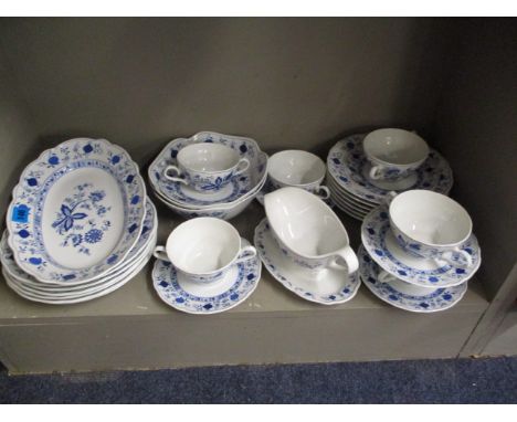 A Form Mariebad Ingres Weiss blue and white onion patterned part dinner service, to include soup bowls with saucers 