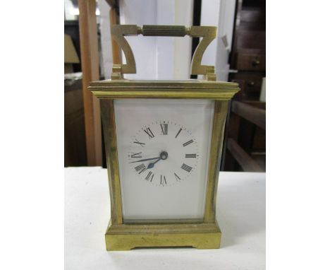 A brass cased five window carriage clock, the backplate marked WJH, 6" high (with key) 