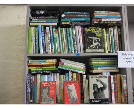 A large quantity of cricket and boxing related books circa 1940 to the present day to include 'Ringside Seat' by Peter Wilson