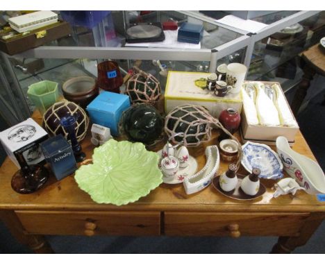 A mixed lot to include Poole, glass fishing floats, Carlton ware and other items 