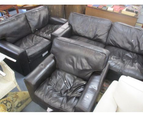 A leather three seater sofa together with a matching two seater and an armchair 