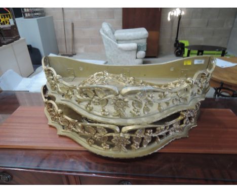 Two metal cast wall shelf or sconce with pierced decoration and gilt