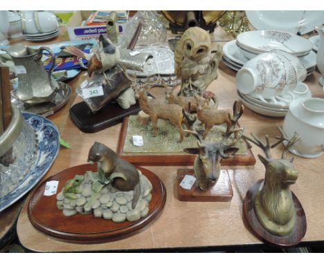 A selection of figures and figurines including Natures Heritage and Nao