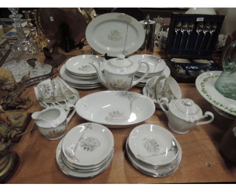 A part tea and dinner service by Fine China Japan
