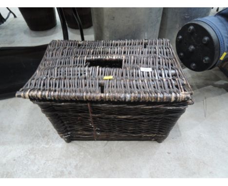 A wicker woven fishing hamper 