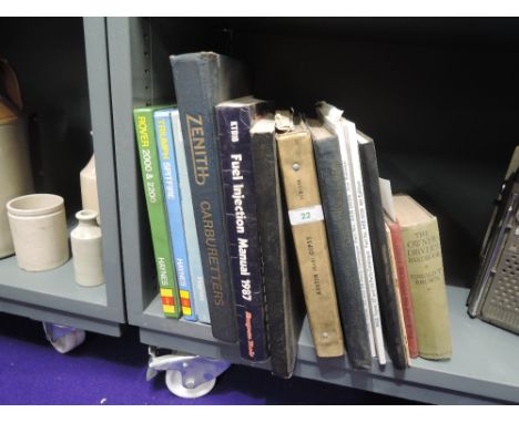 A selection of automotive car and motor engine guide and reference books including Austin Gypsy and popular Ford