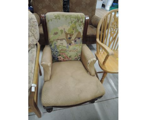 A Victorian mahogany frame armchair having tapestry back