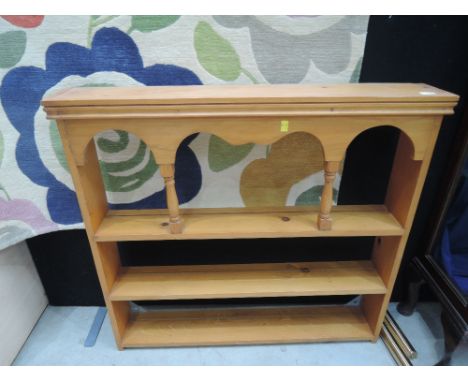 A pine plate rack or wall shelf