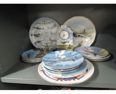 A selection of aviation and military display plates and ceramic mantle clock