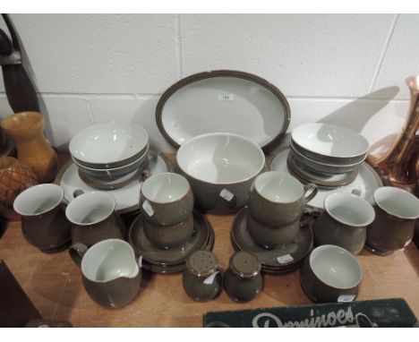 A part dinner and tea service by Denby with two tone slat glaze finish. Condition, good condition apart from one mug badly ch