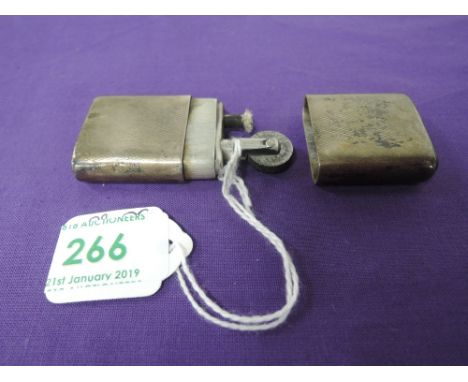 A silver Howitt Lighter having engine turned decoration to case, Sheffield 1944, Dudley Russell Howitt
