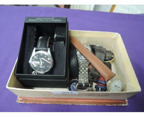 A small selection of fashion wrist watches including Tommy Spirit, Timex, Slazenger etc