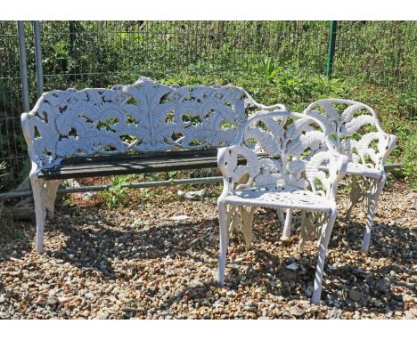 A Coalbrookdale style cast iron garden bench,20th century, the curved back cast with fern,147cm wide63cm deep79cm high, seat 