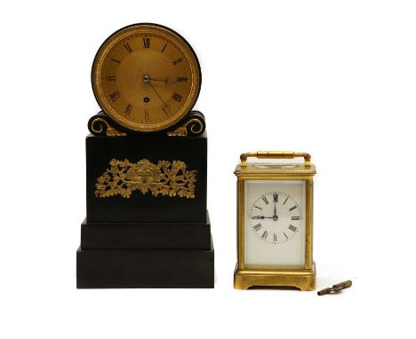 A French Empire style slate mantel timepiece,early 20th century, with a single train movement, complete with pendulum,27cm hi