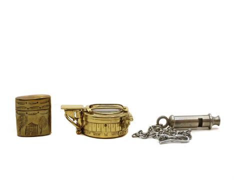 A WWI trench art brass vesta case,4.5cm hightogether with a MK 111 Prismatic Military Compassno. 1065, in its original box,9c