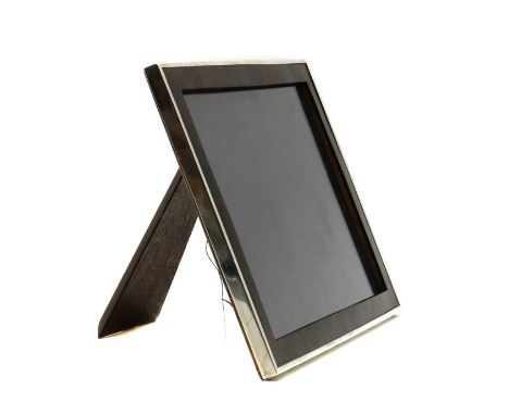 A silver and faux tortoiseshell photograph frame,by Mappin &amp; Webb Ltd, Birmingham 1930, with adjustable easel back,frame 