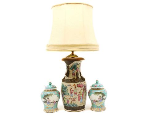 A Chinese famille rose porcelain vase,converted to a lamp, with a cream shade,the vase 34cm hightotal 70cm hightogether with 