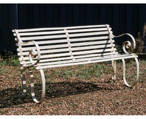 A wrought iron garden bench,with scroll end supports,153cm wide67cm deep83cm high, seat 43cmCondition ReportWith signs of wea