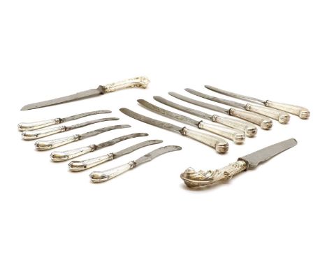 A group of silver pistol grip knives,early to mid 19th century, comprising a set of six, with an engraved heron crest, a smal