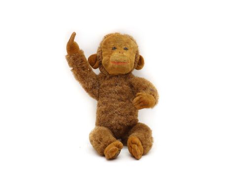 A Merrythought toy mohair monkey,with label to foot,23cm highCondition ReportSome patch losses to mohair, possible moth damag