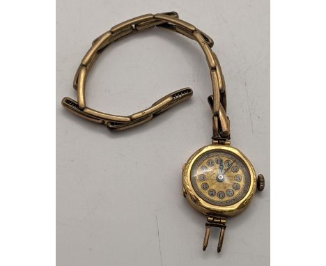 A 18ct gold ladies manual wind wristwatch A/F, on a later gold plated bracelet, total weight 15.4gLocation: 