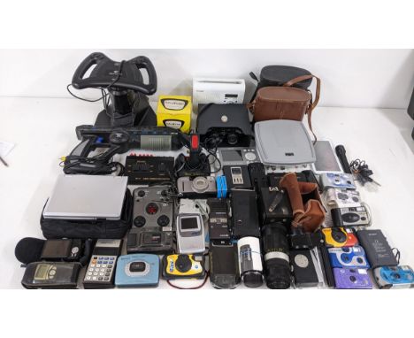 A collection of electronics to include cameras, a Junior Box Brownie, gaming accessories, vintage binoculars, amplifiers, an 