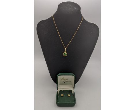 A yellow metal pendant stamped 585 set with jade one a 14ct gold necklace total weight 1.8g together with a pair of 18ct gold