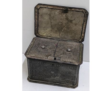 A late 19th century silver plated tea caddy with chased engraved gothic style decoration and two fitted compartments, 10cm h 