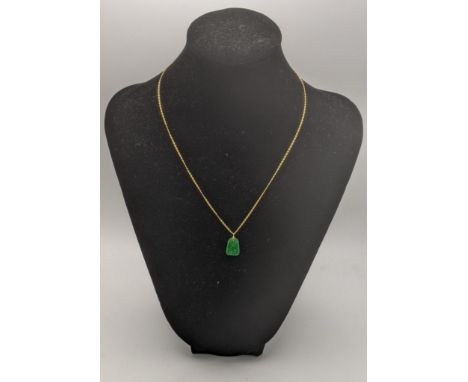 A gold and jade bracelet on a 14ct gold necklace 2.7gLocation: 