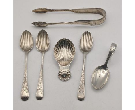 Mixed silver items to include three teaspoons having seashell style bowls, together with a similar pair of sugar tongs, and t