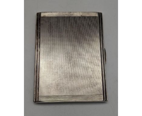 A silver D.Bros cigarette case having an engine turned design, hallmarked Birmingham 1937, 179.9gLocation: 