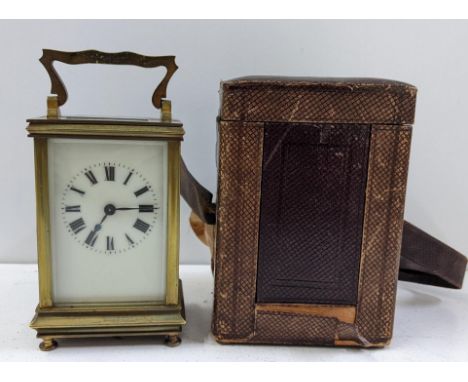 An early 20th century gilt metal 8-day carriage clock in a fitted travel case Location: 