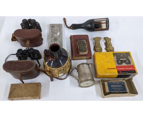 Mixed collectables to include a silver plate milk jug, Victorian brass clips, two pairs of vintage binoculars, a Kodak Kodasl