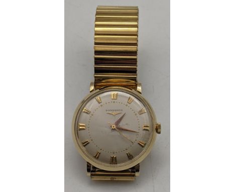 A 1950s 14ct gold Longines manual wind watch with engraving to the case back Location: 