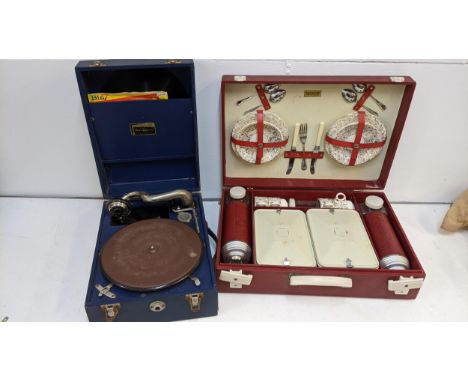 A Brexton picnic hamper and a Broadcaster gramophone in a blue case Location: 