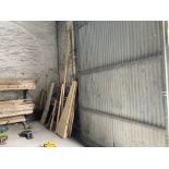 Large quantity of wood offcuts throughout work shop
