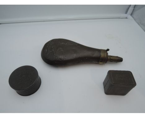 A selection of sporting and dog related items including Richmonds powder flask and early dog soap tin 