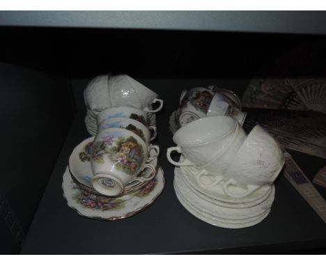 A selection of tea cups and saucers including Coalport country ware